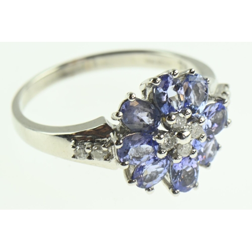 109 - 14ct white gold, tanzanite and diamond ring, size O, gross weight 3.69 grams