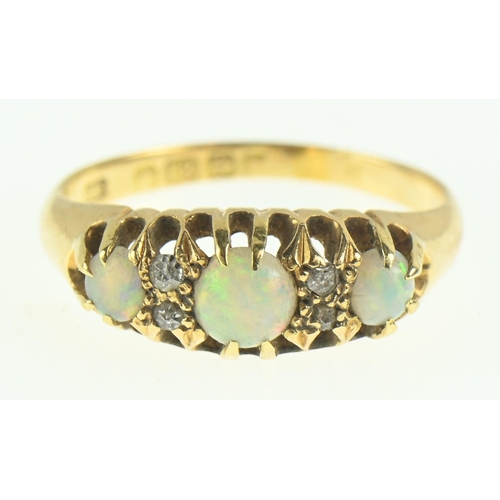 113 - 18ct gold, opal and diamond ring, size O1/2, gross weight 3.54 grams