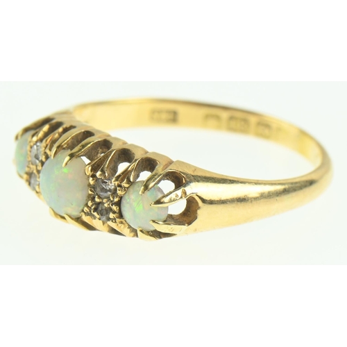 113 - 18ct gold, opal and diamond ring, size O1/2, gross weight 3.54 grams