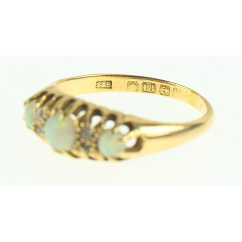 113 - 18ct gold, opal and diamond ring, size O1/2, gross weight 3.54 grams