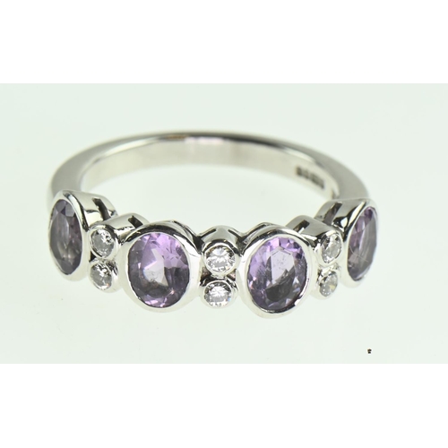 115 - 18ct white gold, amethyst and diamond ring, size M, gross weight 4.93 grams