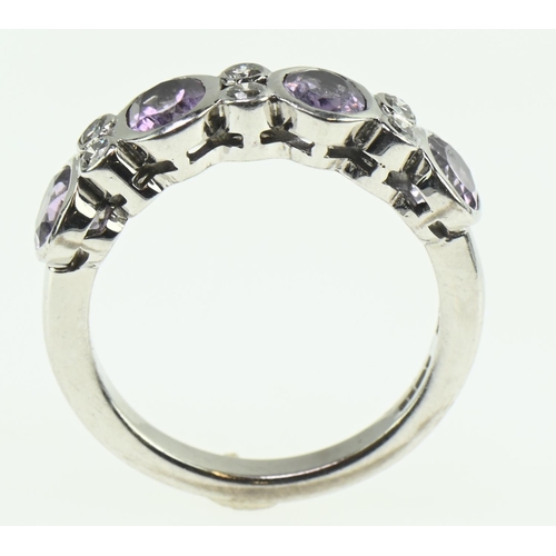 115 - 18ct white gold, amethyst and diamond ring, size M, gross weight 4.93 grams