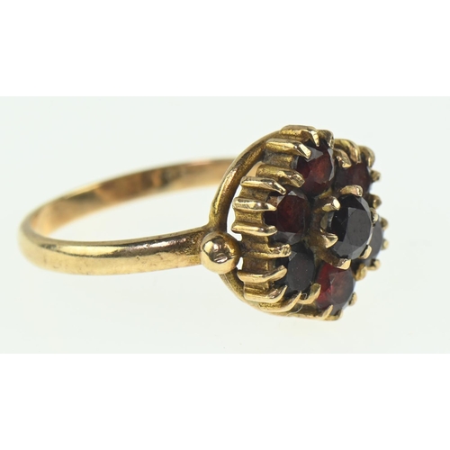 116 - 9ct gold and garnet cluster ring, size O1/2, gross weight 3.38 grams