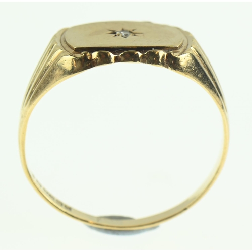 123 - 9ct gold signet ring set with a small diamond, size S1/2, gross weight 4 grams