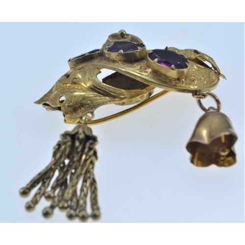 133 - 9ct gold and paste mourning brooch, of scrolled leaf design with bell and tassel, gross weight 8.26 ... 