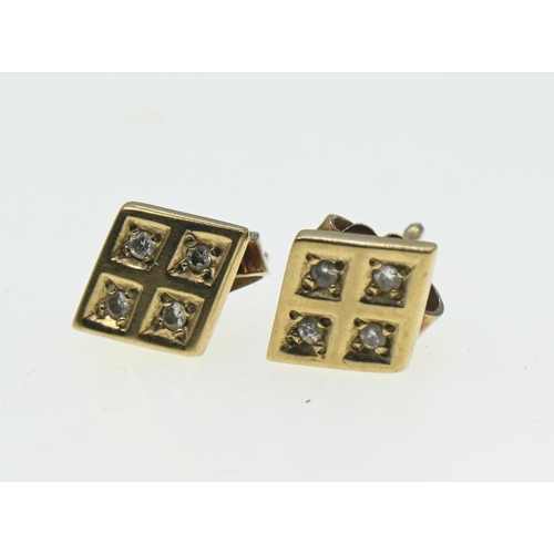 141 - Pair of 9ct gold and diamond ear studs of diamond shape, gross weight 1.76 grams