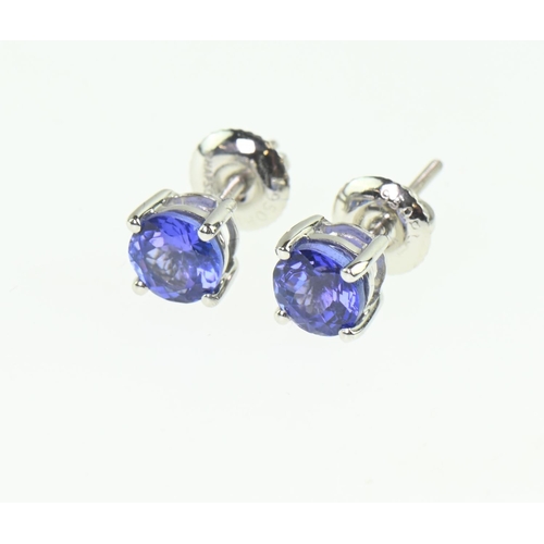 154 - Pair of platinum and tanzanite ear studs, with screw post fittings, gross weight 1.96 grams