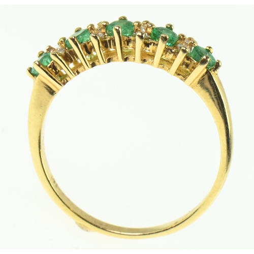 157 - Emerald and diamond ring set in 18ct gold, size P1/2, gross weight 3.22 grams