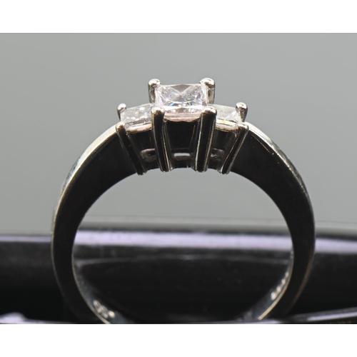 171 - 18ct white gold and princess-cut diamond three stone ring, size K1/2, gross weight 4.23 grams