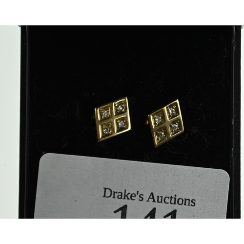 141 - Pair of 9ct gold and diamond ear studs of diamond shape, gross weight 1.76 grams