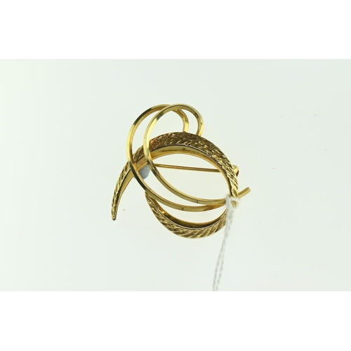 176 - 9ct gold brooch, designed as swirls, length 30mm, 3.06 grams