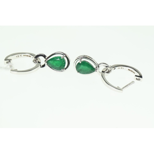 183 - Pair of 18ct white gold and emerald pendant earrings, length 24mm, gross weight 3.68 grams