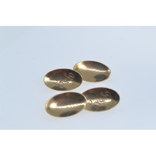 188 - Pair of 9ct gold cufflinks, hallmarked London 1965, engraved initials to one concave oval face, leng... 