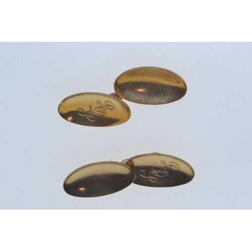 188 - Pair of 9ct gold cufflinks, hallmarked London 1965, engraved initials to one concave oval face, leng... 