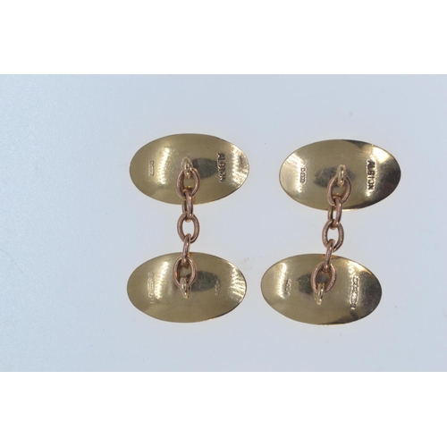 188 - Pair of 9ct gold cufflinks, hallmarked London 1965, engraved initials to one concave oval face, leng... 