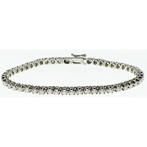 196 - 18ct white gold and diamond tennis bracelet,  claw-set with 51 round brilliant cut diamonds measurin... 