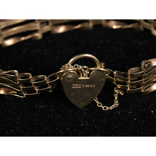 206 - 9ct gold gate link bracelet with heart-shaped clasp and safety chain, gross weight 9.48 grams