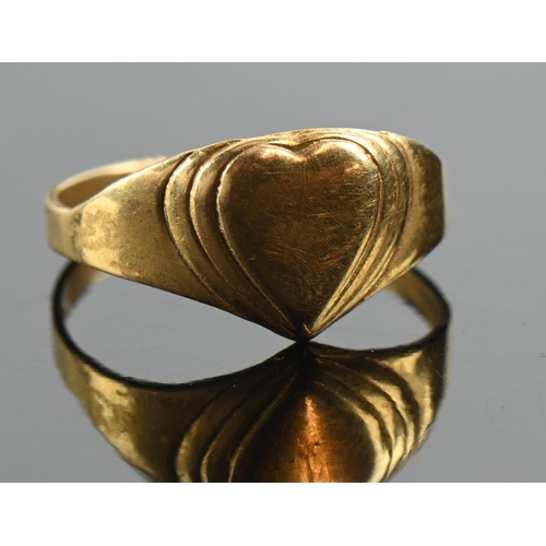 219 - Small 18ct gold signet ring of heart-shaped design, size F, 1.2 grams