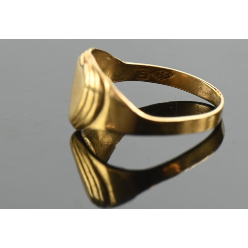 219 - Small 18ct gold signet ring of heart-shaped design, size F, 1.2 grams