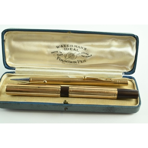 272 - Waterman's 9ct gold cased 'Ideal' fountain pen with a 14ct gold nib and 9ct gold cased propelling pe... 