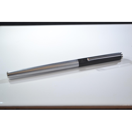 275 - 1980's Montblanc slimline fountain pen with brushed stainless steel body and matt black top.