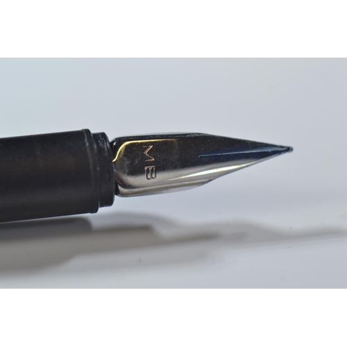 275 - 1980's Montblanc slimline fountain pen with brushed stainless steel body and matt black top.