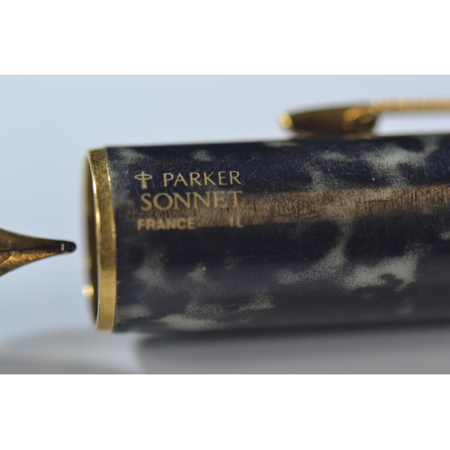 276 - Two fountain pens, one Parker Sonnet Moonbeam Marble 18k nibbed pen and one Parker fountain pen 925 ... 