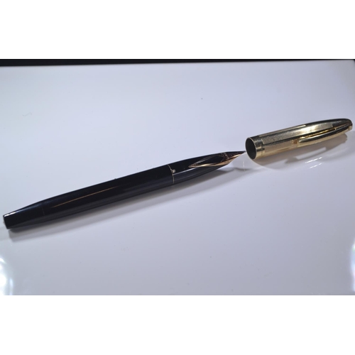 285 - Five 14k gold nibbed Sheaffer pens inc, one Australian and two with rolled gold case.