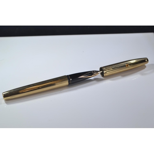 285 - Five 14k gold nibbed Sheaffer pens inc, one Australian and two with rolled gold case.