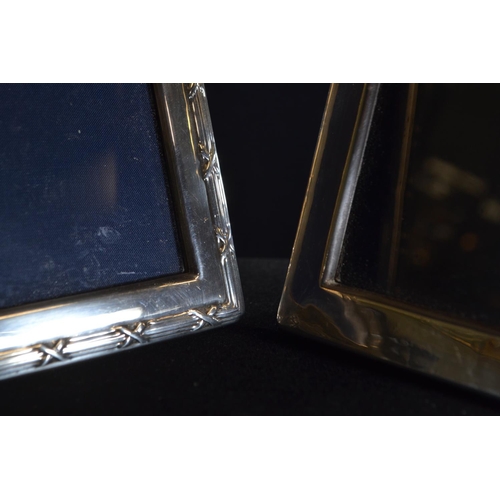 297 - Two silver photo frames, including: a rectangular frame by Carr's of Sheffield Ltd, Sheffield 1990, ... 