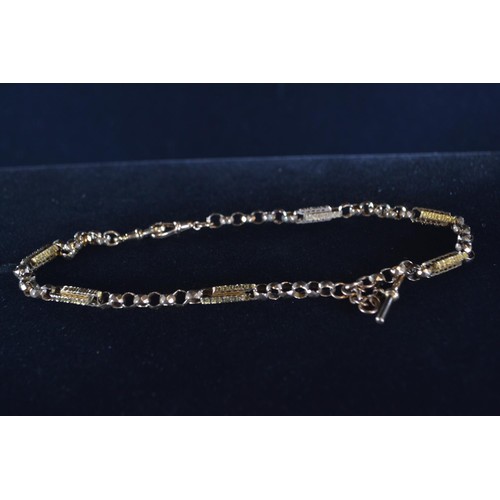 102 - 9ct gold fancy link belcher chain with T-bar, circumference 455mm, gross weight 24.63 grams