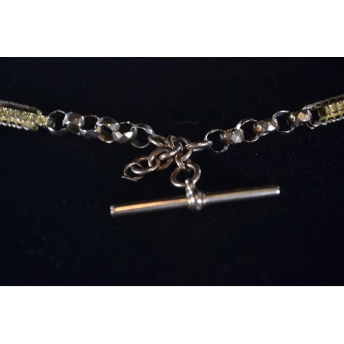 102 - 9ct gold fancy link belcher chain with T-bar, circumference 455mm, gross weight 24.63 grams