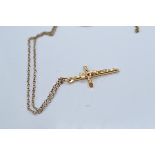 137 - 14ct gold cross pendant, 1.2 grams, together with a 9ct gold neck chain, circumference 485mm, and a ... 