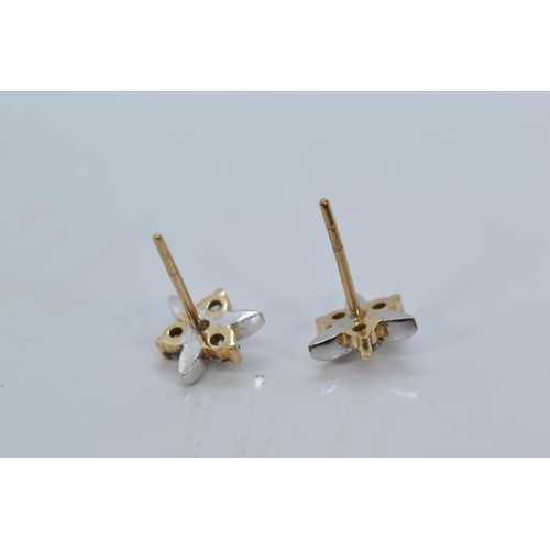 144 - Pair of diamond earrings on 9ct gold. Gross weight 2.34g