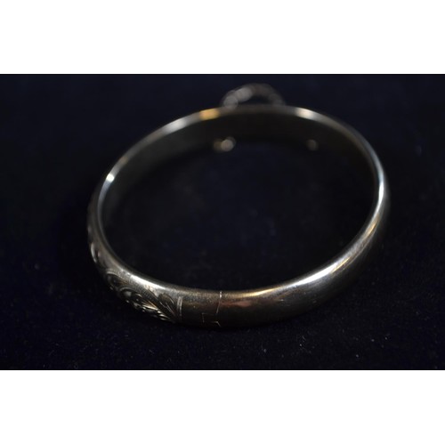 194 - 9ct gold hinged bangle, inner diameter 61mm, 10.27 grams