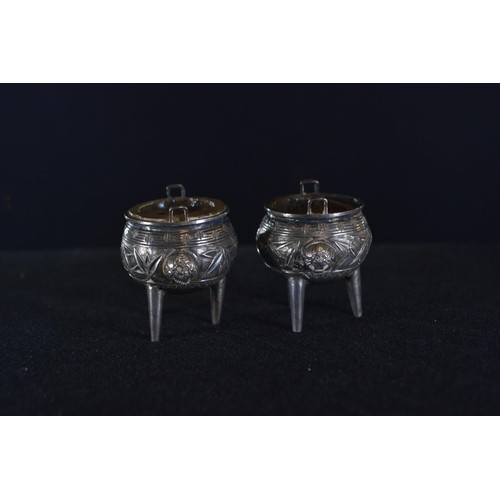 308 - Pair of Chinese export silver salts, in the form of incense burners, with glass liners, indecipherab... 