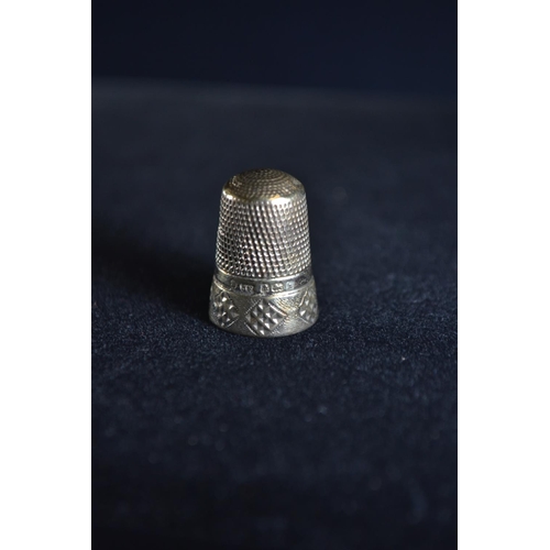 319 - Six silver thimbles, various makers and dates, including one by James Swann & Son Birmingha... 