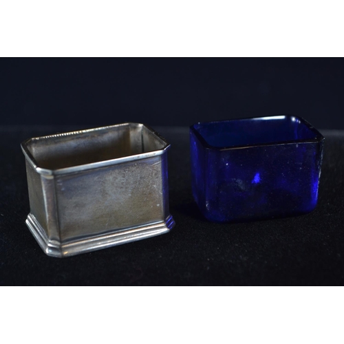 330 - Silver three piece cruet set, Adie Brothers Ltd, Birmingham 1929, the salt and mustard with blue gla... 