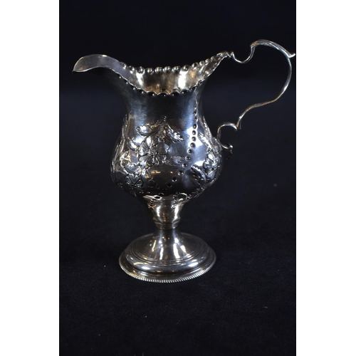 345 - George III silver pedestal cream jug, maker's mark unclear, London 1783, later embossed with fo... 