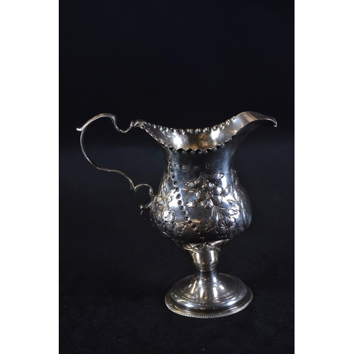 345 - George III silver pedestal cream jug, maker's mark unclear, London 1783, later embossed with fo... 