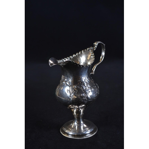 345 - George III silver pedestal cream jug, maker's mark unclear, London 1783, later embossed with fo... 