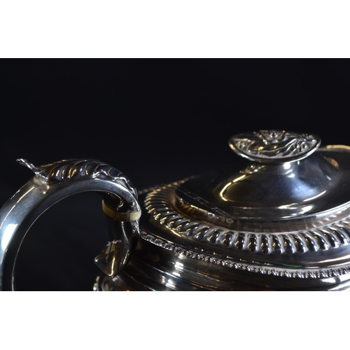 352 - George III silver teapot, maker's mark rubbed, London 1818, with a presentation inscription dated 18... 