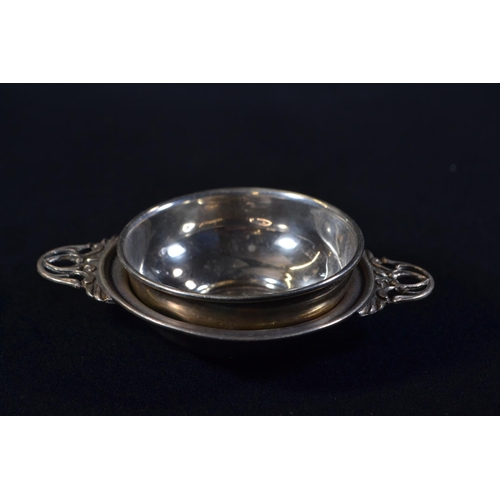 358 - Silver twin-handled tea strainer and bowl, Joseph Gloster Ltd, Birmingham 1961, strainer width ... 