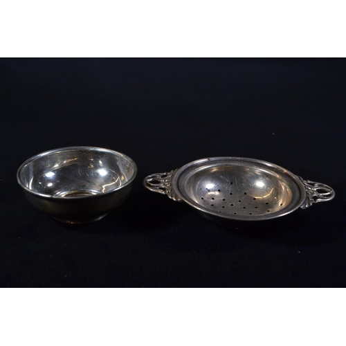 358 - Silver twin-handled tea strainer and bowl, Joseph Gloster Ltd, Birmingham 1961, strainer width ... 