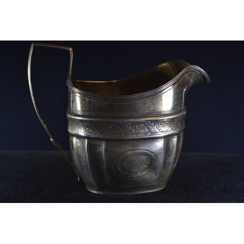 360 - George III silver cream jug, maker's mark rubbed, London 1806, with bright cut decoration, leng... 