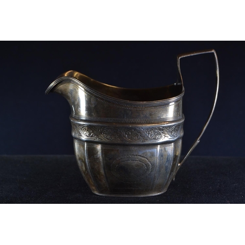 360 - George III silver cream jug, maker's mark rubbed, London 1806, with bright cut decoration, leng... 