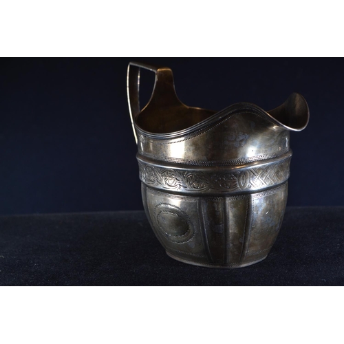 360 - George III silver cream jug, maker's mark rubbed, London 1806, with bright cut decoration, leng... 