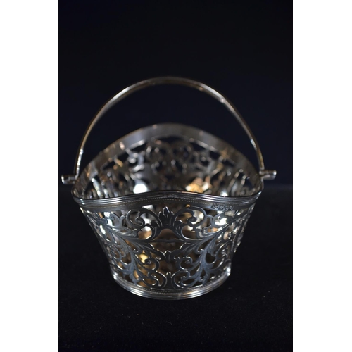 369 - Edwardian silver pierced swing handled basket, George Nathan & Ridley Hayes, Chester 1902, heigh... 