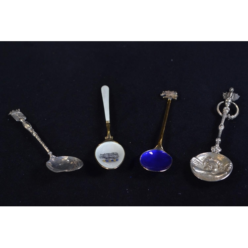 385 - Two silver gilt and enamel 'The Worshipful Society of Apothecaries' coffee spoons with rhino symbol,... 