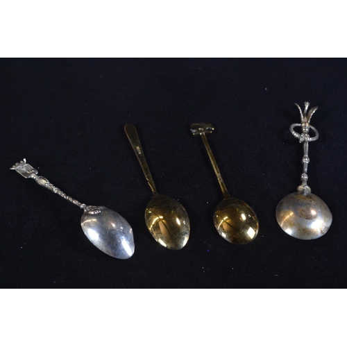 385 - Two silver gilt and enamel 'The Worshipful Society of Apothecaries' coffee spoons with rhino symbol,... 